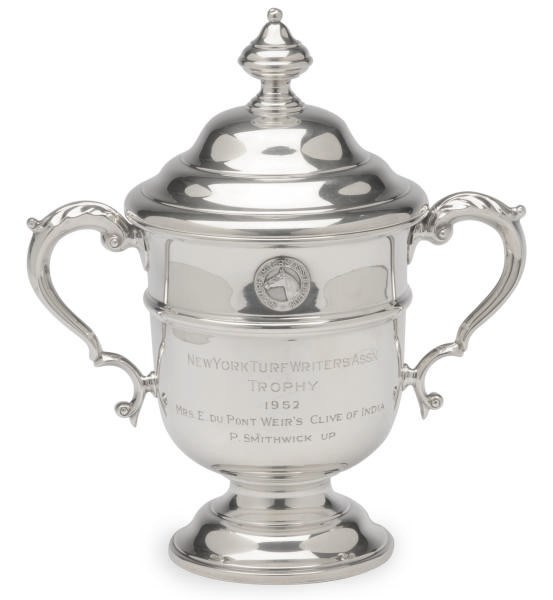 AN AMERICAN SILVER PRESENTATION CUP AND COVER AND AN ELIZABETH II SILVER DISH,