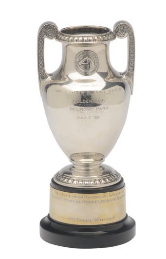 AN AMERICAN SILVER AMPHORA-FORM TROPHY AND SILVER-MOUNTED WOOD BASE,