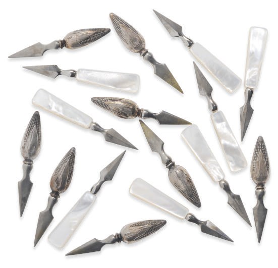 A SET OF EIGHT AMERICAN SILVER CORN SPEARS AND A SET OF EIGHT GERMAN SILVER-PLATED AND MOTHER-OF-PEARL CORN SPEARS,