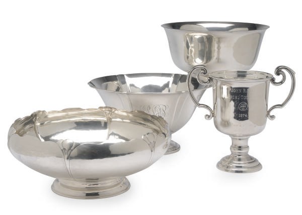 A GROUP OF THREE AMERICAN SILVER BOWLS AND A TWO-HANDLED TROPHY,