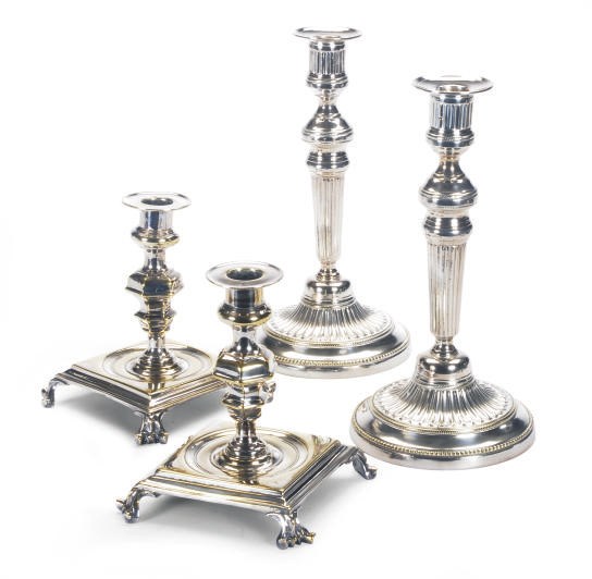 TWO PAIRS OF SILVER-PLATED CANDLESTICKS,