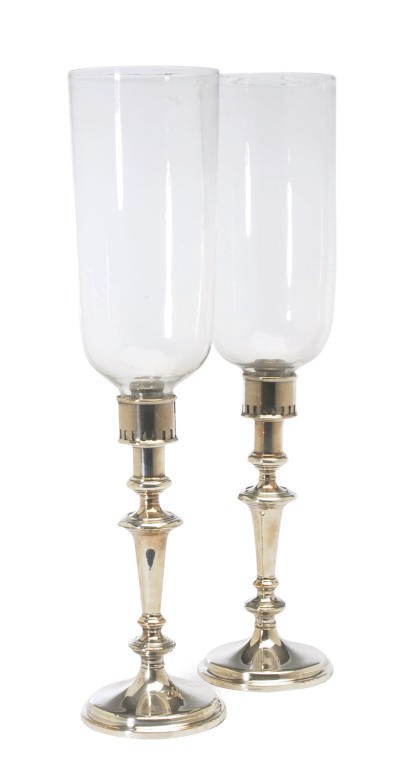 A PAIR OF SHEFFEILD-PLATED CANDLESTICKS WITH GLASS SHADES,