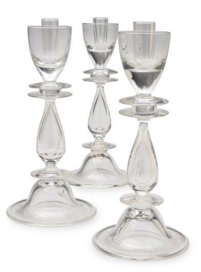 A SET OF THREE LARGE AMERICAN GLASS CANDLESTICKS,