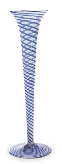 A CLEAR GLASS TRUMPET-FORM VASE WITH BLUE AND WHITE DIAGONAL STRIPES,