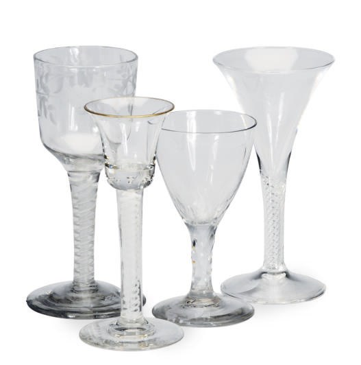 A GROUP OF GLASS STEMWARE,