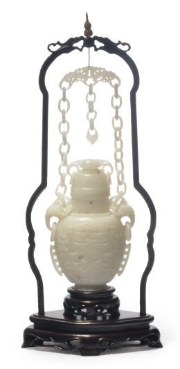 A CHINESE WHITE JADE FLATTENED BALUSTER VASE AND COVER,