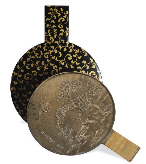 A JAPANESE POLISHED BRONZE HAND MIRROR IN A FITTED LACQUER CASE,