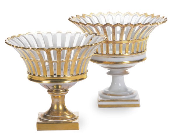 A PAIR OF PARIS PORCELAIN GILT WHITE FOOTED RETICULATED BASKETS AND A SIMILAR BASKET,