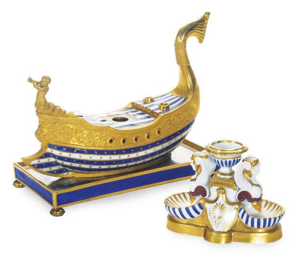 A FRENCH PORCELAIN GILT GALLEON-FORM INKWELL AND STAND AND A PARIS PORCELAIN FOUNTAIN-FORM INKWELL,