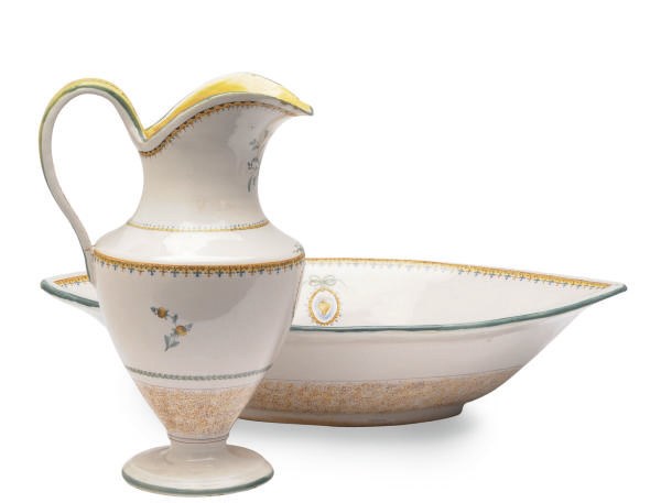 A FRENCH FAIENCE HELMET-SHAPED EWER AND NAVETTE-SHAPED BASIN,