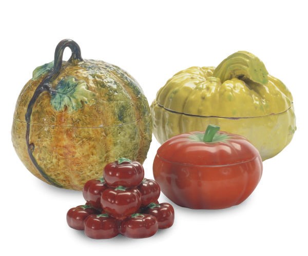 A GROUP OF CONTINENTAL FAIENCE MODELS OF FRUITS AND VEGETABLES,