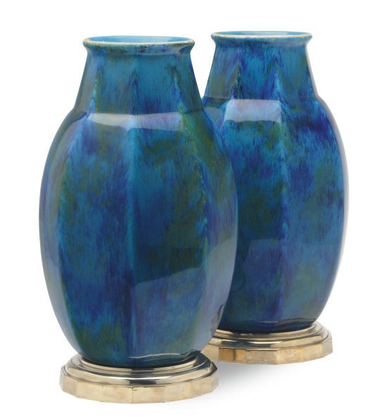 A PAIR OF FRENCH FAIENCE BLUE GROUND OCTAGONAL VASES AND SILVERED METAL STANDS,