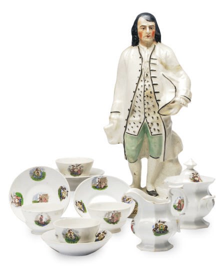 A STAFFORDSHIRE FLATBACK FIGURE OF BENJAMIN FRANKLIN,