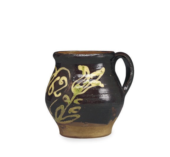 AN AMERICAN GLAZED POTTERY REDWARE JUG,