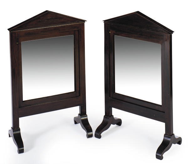 A PAIR OF MAHOGANY ARCHITECTURAL-FORM FIRESCREENS,