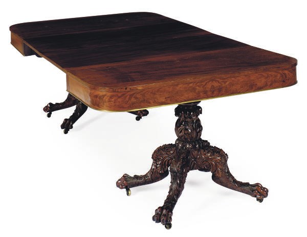 AN AMERICAN LATE CLASSICAL MAHOGANY DOUBLE-PEDESTAL EXTENDING DINING TABLE,