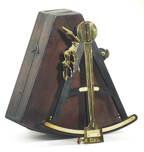 A CASED EBONY, IVORY AND BRASS SEXTANT**,