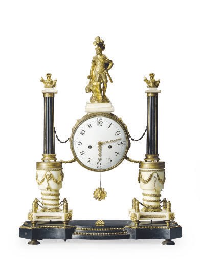 A LOUIS XVI ORMOLU-MOUNTED BLACK AND WHITE MARBLE MANTEL CLOCK,