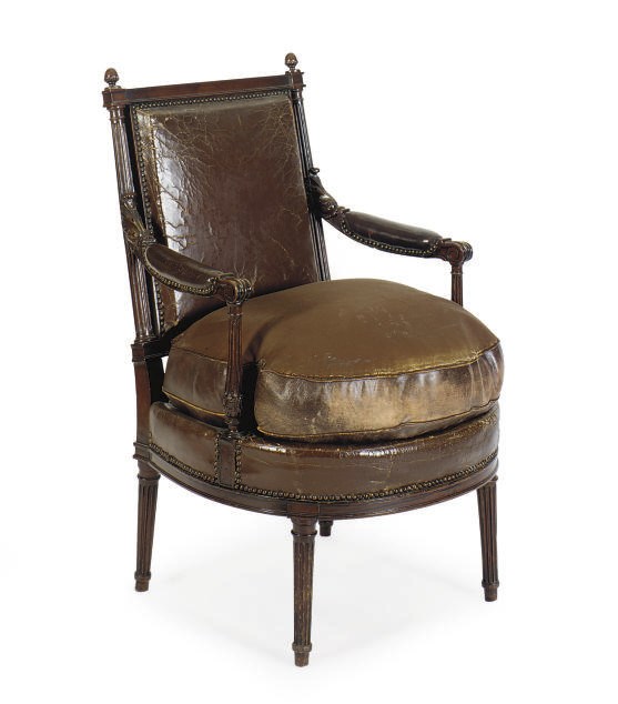 A LOUIS XVI MAHOGANY AND LEATHER UPHOLSTERED FAUTEUIL,