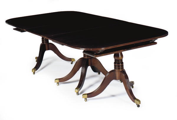 A FEDERAL MAHOGANY TRIPLE PEDESTAL DINING TABLE