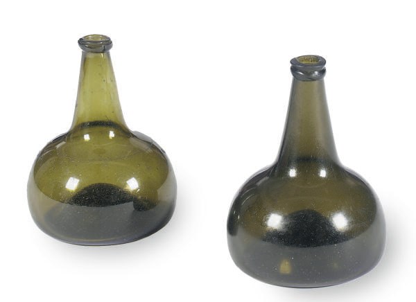 TWO GREEN BLOWN-GLASS BOTTLES,