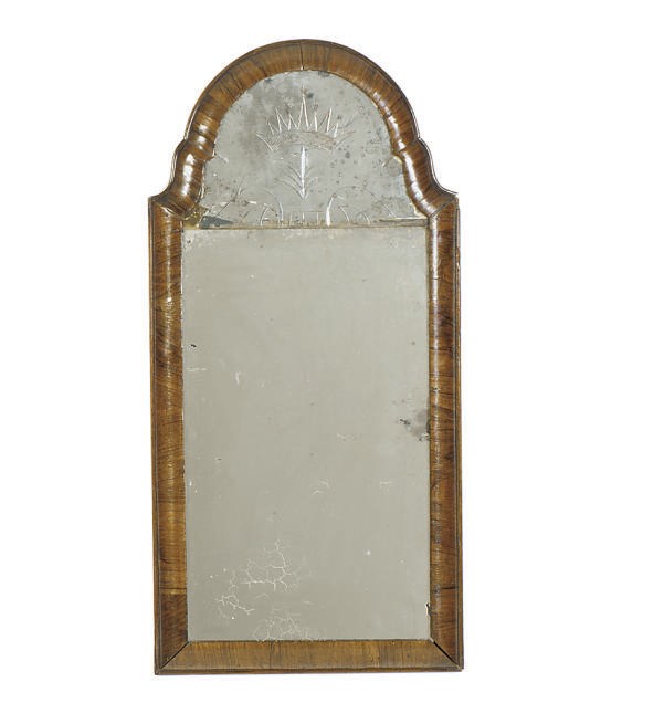 A NORTH EUROPEAN WALNUT MIRROR,