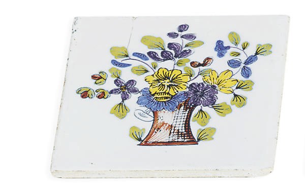A GROUP OF GLAZED CERAMIC TILES,