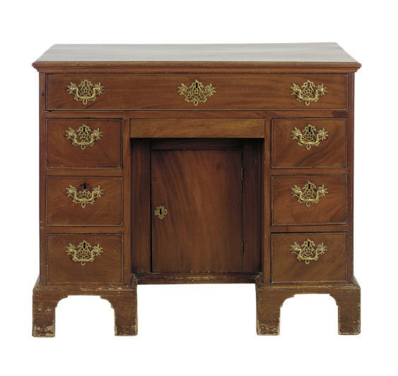 AN ENGLISH MAHOGANY KNEEHOLE DESK,