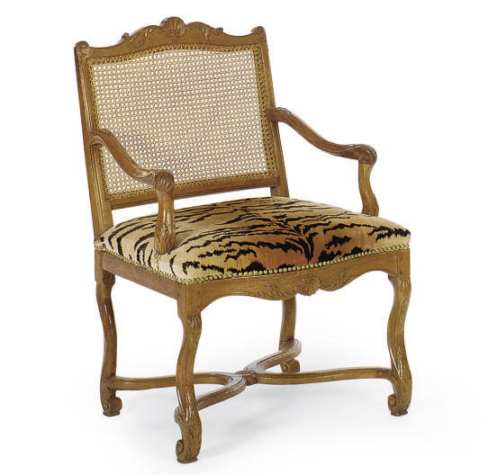 A REGENCE BEECHWOOD AND CANED FAUTEUIL,
