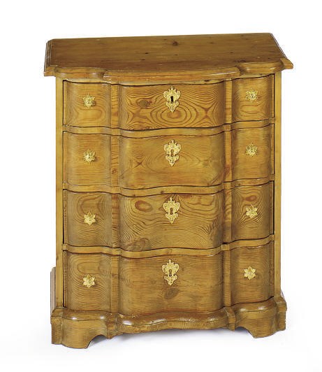 A NORTH EUROPEAN PINE DIMUNITIVE SERPENTINE COMMODE,
