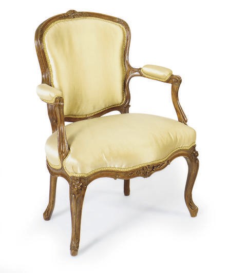 A LOUIS XV BEECHWOOD FAUTEUIL,