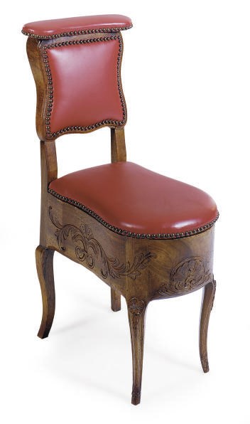A FRENCH PROVINCIAL WALNUT BIDET,