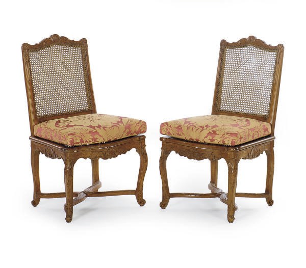 A PAIR OF REGENCE BEECHWOOD AND CANED CHAISES,