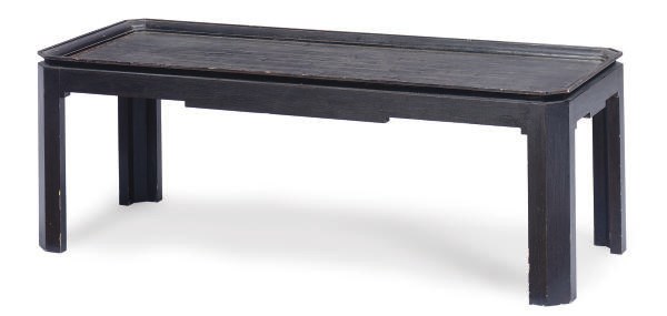 AN EBONIZED AND PARCEL-GILT COFFEE TABLE,
