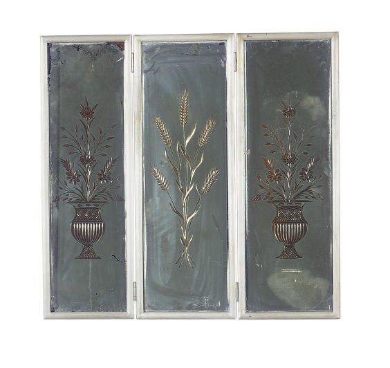 A SILVERED-WOOD THREE-PANEL MIRROR,