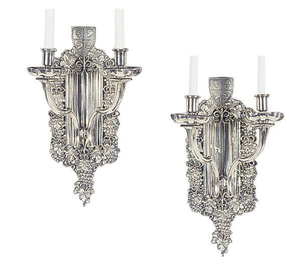 A PAIR OF SILVERED-METAL TWO-BRANCH WALL LIGHTS,