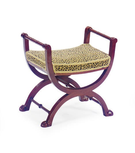 A FRENCH MAHOGANY AND UPHOLSTERED CURULE-FORM BENCH,