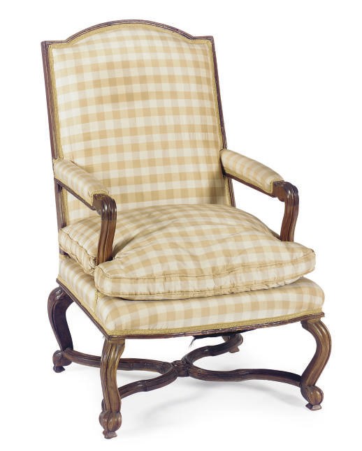 A FRENCH WALNUT AND UPHOLSTERED FAUTEUIL,