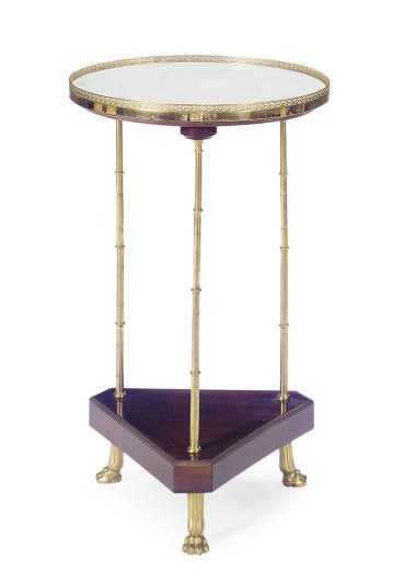 A FRENCH ORMOLU-MOUNTED MAHOGANY AND MARBLE-TOP GUERIDON,