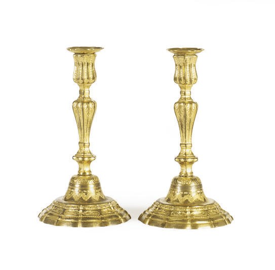 A PAIR OF CONTINENTAL GILT-BRONZE CANDLESTICKS,