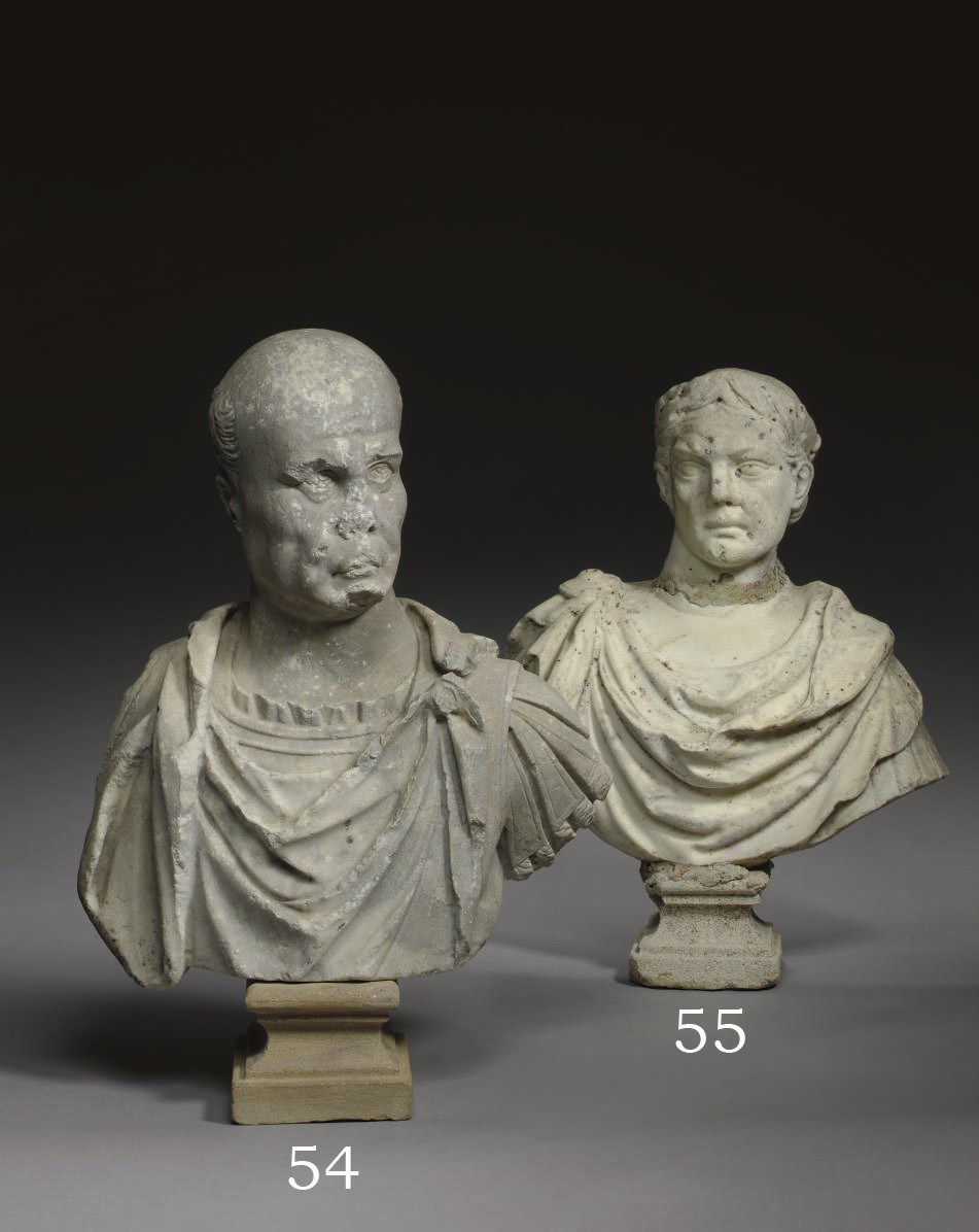 A WHITE MARBLE BUST OF AN EMPEROR