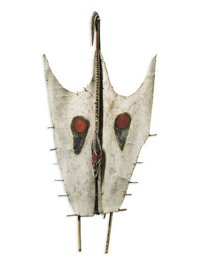 A SEPIK CANOE ORNAMENT,