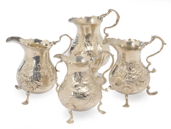 A GROUP OF FOUR GEORGIAN CREAM JUGS,