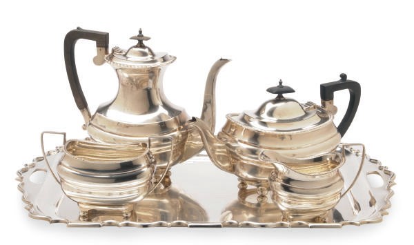A GEORGE V SILVER FOUR PIECE TEA AND COFFEE SERVICE AND TRAY,