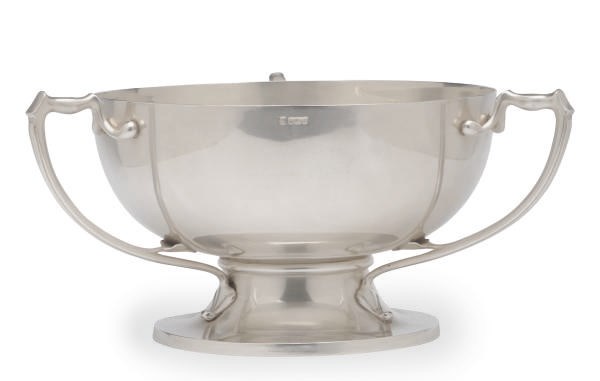 A LARGE EDWARD VII SILVER THREE-HANDLED SILVER FOOTED BOWL,