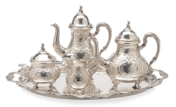 A GERMAN SILVER FOUR PIECE TEA SERVICE AND TRAY,