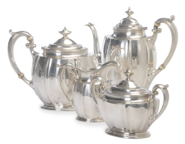 AN AMERICAN SILVER FOUR PIECE SILVER TEA AND COFFEE SET,**