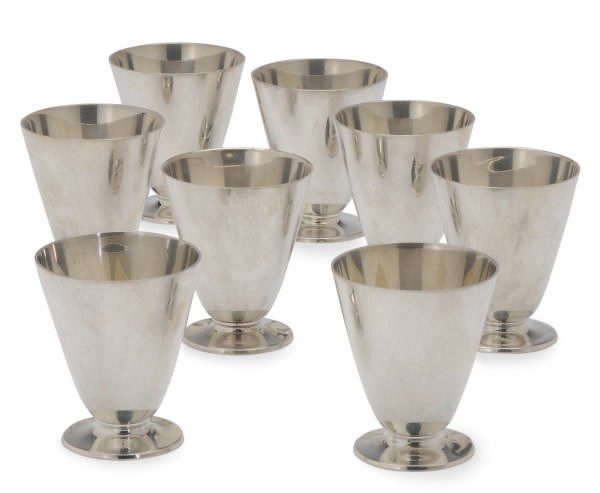 A SET OF EIGHT AMERICAN SILVER FOOTED TUMBLERS,