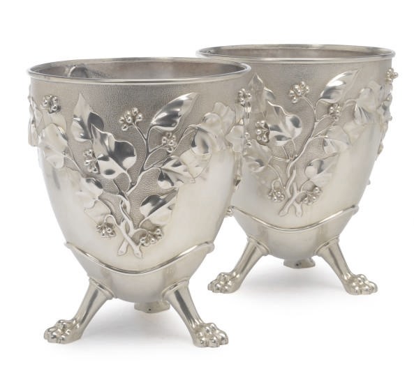 A PAIR OF VICTORIAN WINE COOLERS AND LINERS ON THREE PAW FEET AND AN AMERICAN SILVER BASKET-WEAVE ICE BUCKET AND LINER,