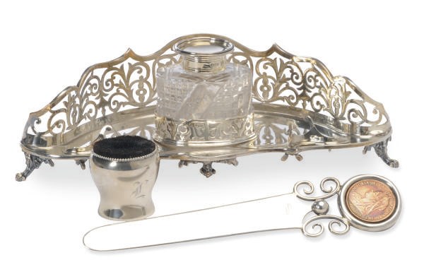 AN EDWARD VII SILVER INKSTAND, SILVER-MOUNTED CUT-GLASS INK POT AND A LETTER OPENER,